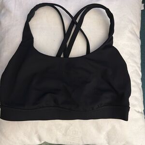 XS black lululemon sports bra size small with criss cross straps.